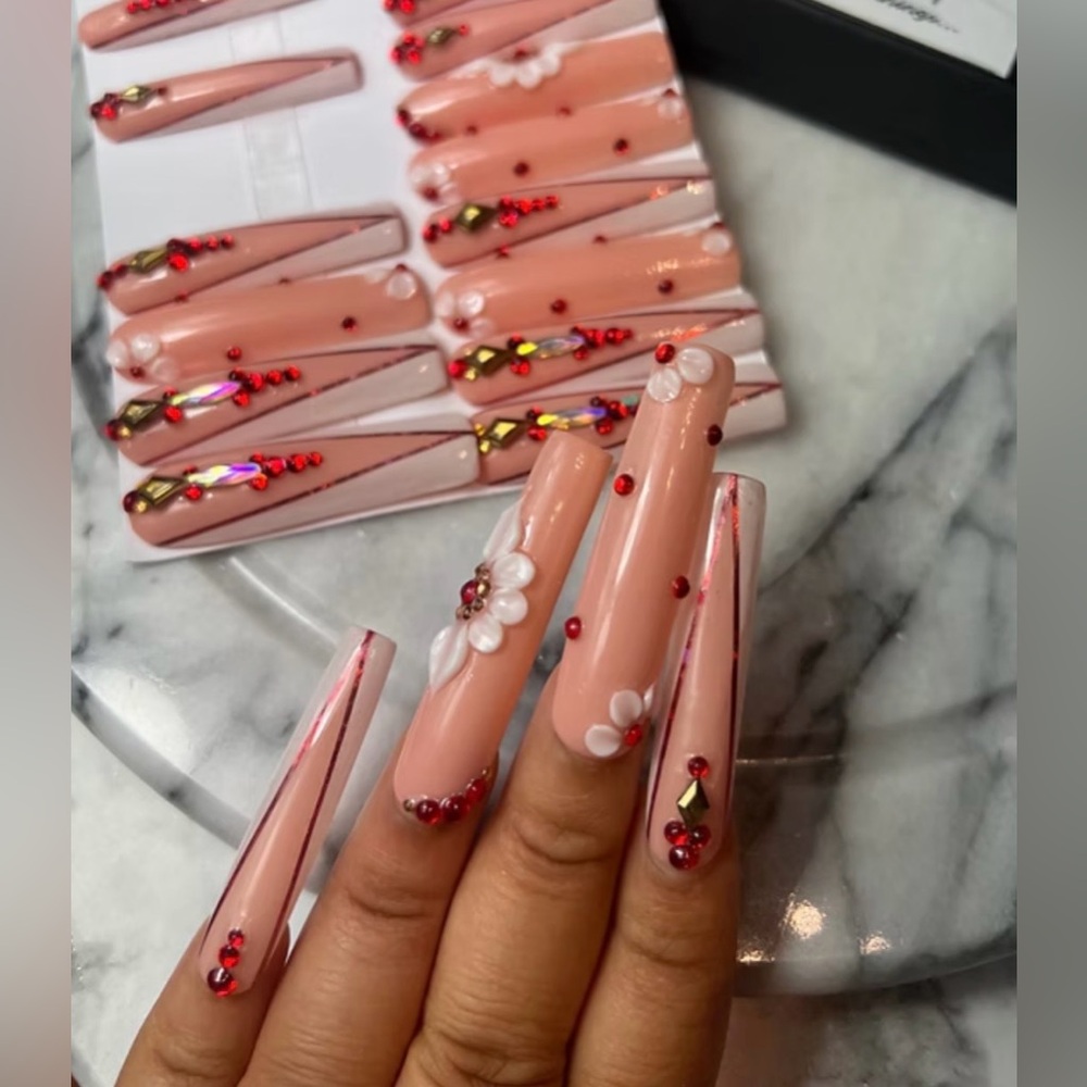 Nude press on nails with red accents